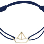 Midnight blue cord bracelet with gold paper boat shaped pendant