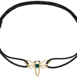 Black cord bracelet with a waterlily shaped gold pendant wIth blue sapphires