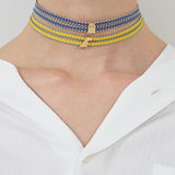 DINO COWBOY CORD NECKLACE