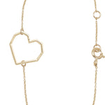Gold chain bracelet with heart shaped pendant