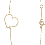 Gold chain bracelet with heart shaped pendant