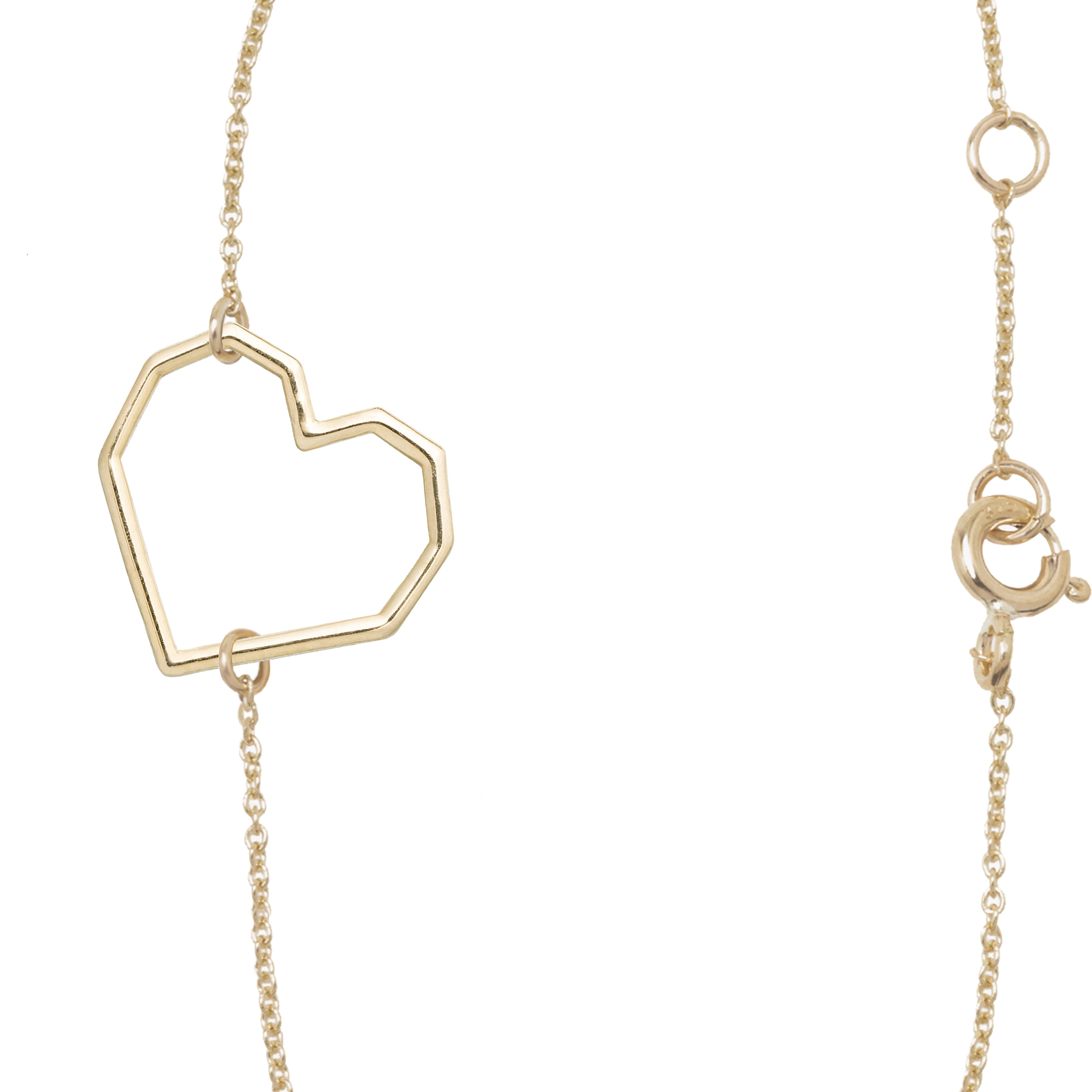 Gold chain bracelet with heart shaped pendant