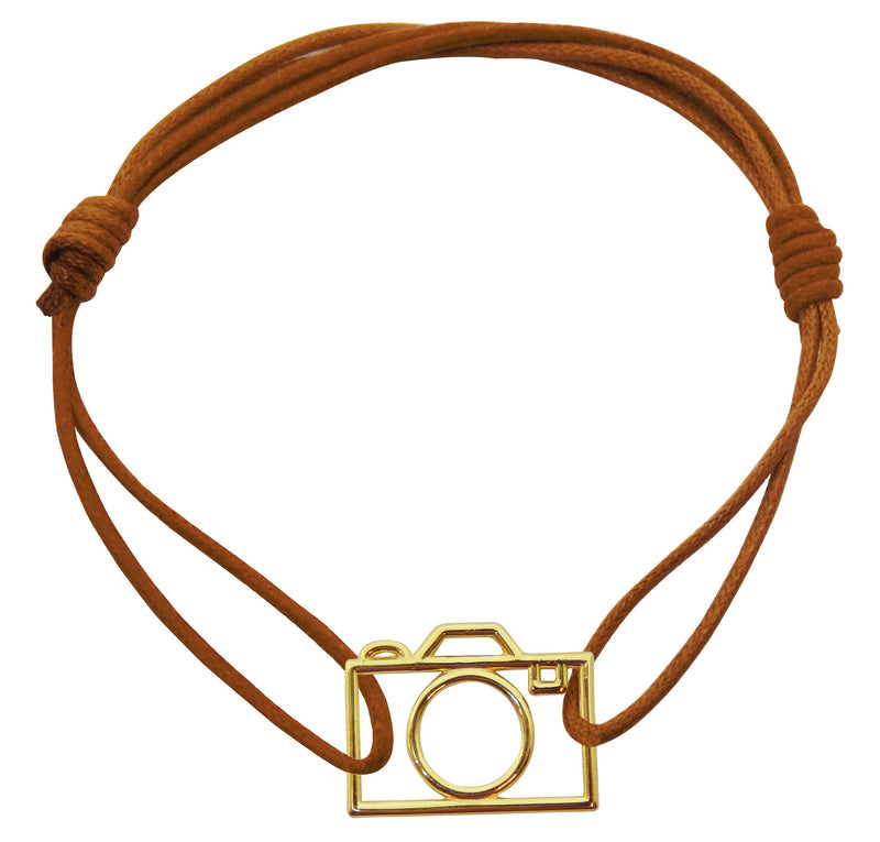 Brown cord bracelet with small camera shaped pendant