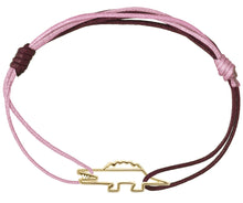 Load image into Gallery viewer, Pink and burgundy cord bracelet with a crocodile shaped gold pendant
