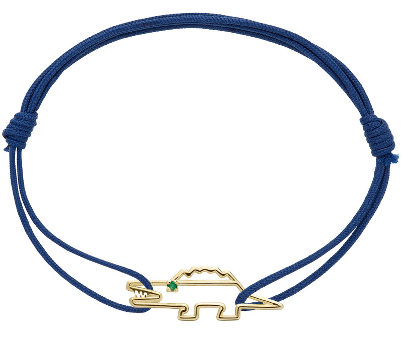 Blue eco cord bracelet with a gold shaped crocodile with a small emerald eye
