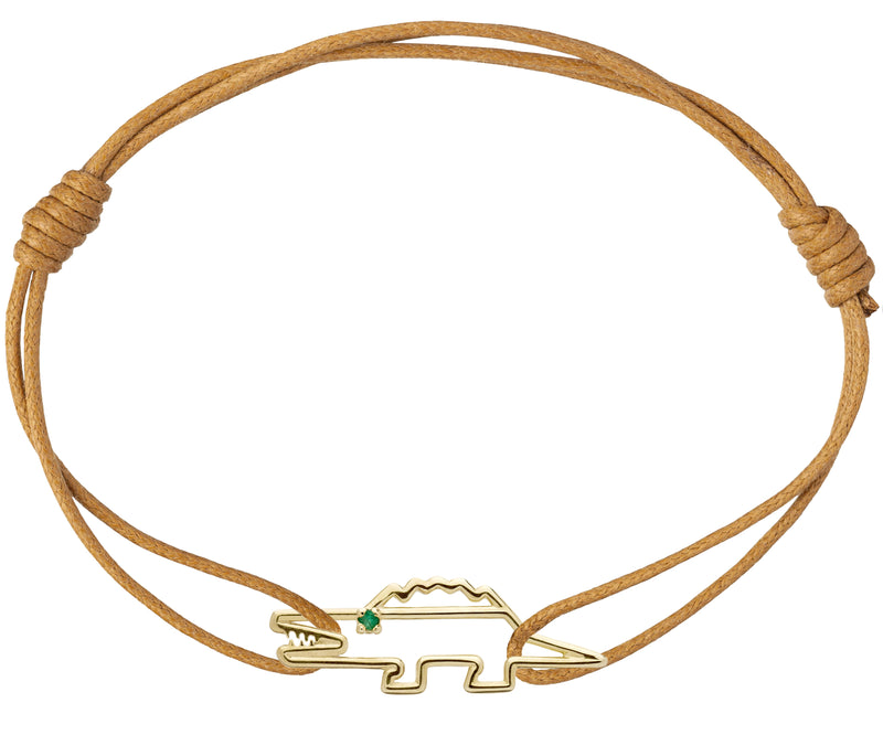 Cognac brown cord bracelet with a gold shaped crocodile with a small emerald eye