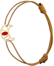 Load image into Gallery viewer, Brown cord bracelet with gold croissant shaped pendant hand-painted in raspberry enamel
