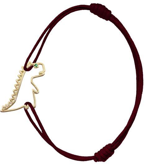 Burgundy cord bracelet with dinosaur shaped pendant and small emerald