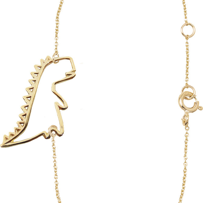 Gold chain bracelet with dinosaur shaped pendant