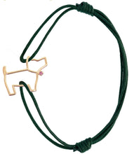 Load image into Gallery viewer, Bottle green cord bracelet with a little dog shaped gold pendant with a pink sapphire
