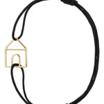 Black eco cord bracelet with a little house shaped gold pendant