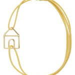 Light yellow eco cord bracelet with a little house shaped gold pendant