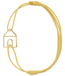 Light yellow eco cord bracelet with a little house shaped gold pendant