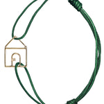 Bottle green cord bracelet with gold house shaped pendant with small diamond