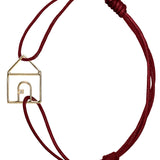 Burgundy cord bracelet with gold house shaped pendant with small diamond
