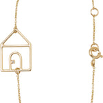 Gold chain bracelet with house shaped pendant and small diamond