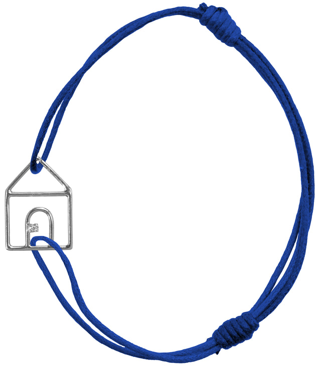Blue cord bracelet with white gold house shaped pendant and small diamond