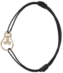 Midnight blue cord bracelet with gold light bulb shaped pendant