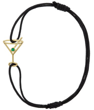Load image into Gallery viewer, Black eco cord bracelet with a martini drink shaped gold pendant with an small emerald
