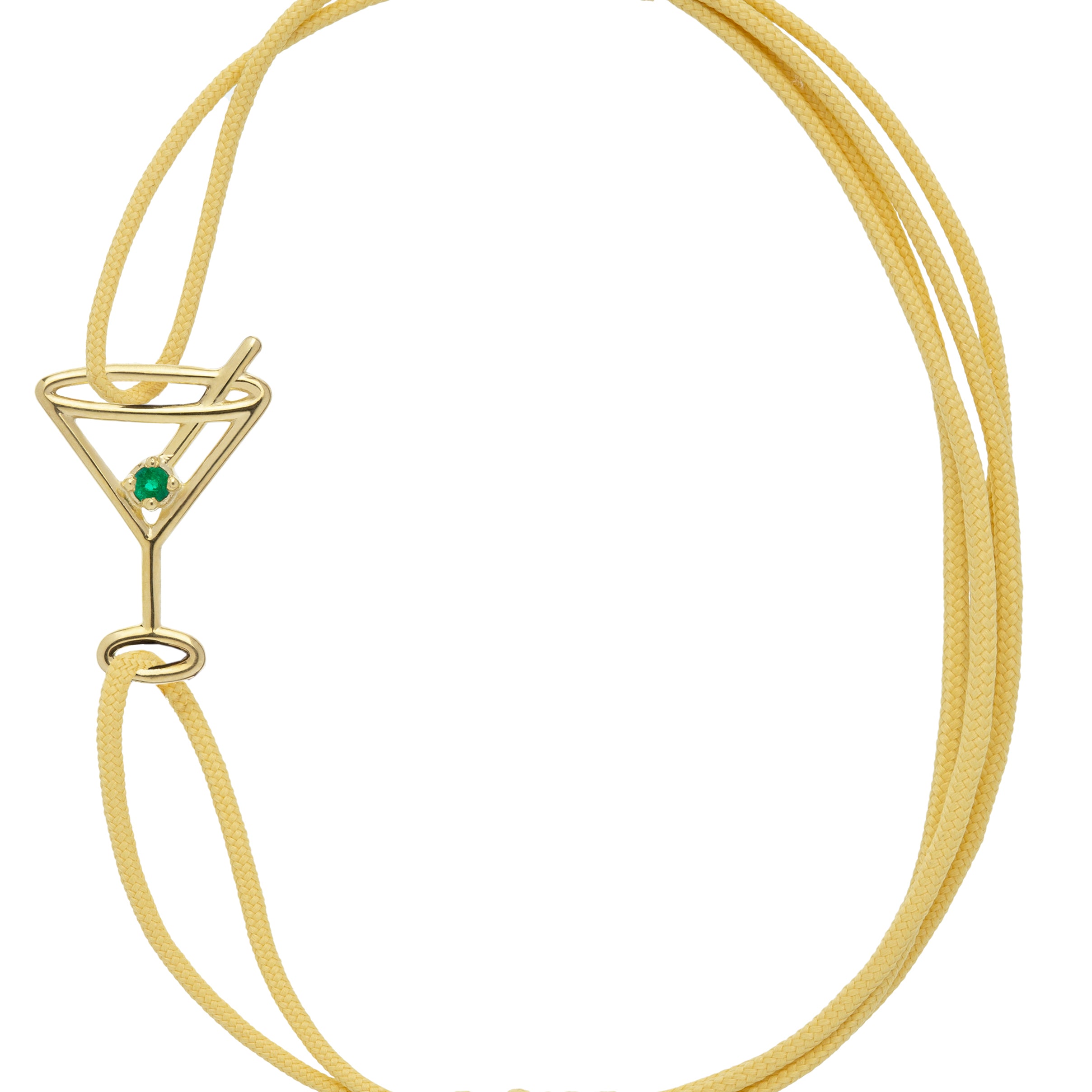 Light yellow eco cord bracelet with a martini drink shaped gold pendant with an small emerald