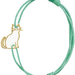 Mint green cord bracelet with a seated cat shaped gold pendant with a small diamond nose