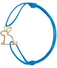 Load image into Gallery viewer, Blue eco cord bracelet with gold rabbit shaped pendant with pearl
