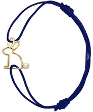 Load image into Gallery viewer, Blue cord bracelet with gold rabbit shaped pendant with pearl
