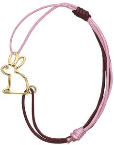 Pink and burgundy cord bracelet with a small rabbit shaped gold pendant with a pink sapphire eye