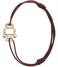 Load image into Gallery viewer, Burgundy cord bracelet with gold robot shaped pendant and blue sapphires
