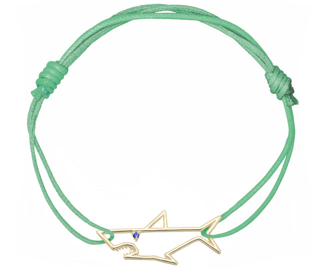 Mint green cord bracelet with shark shaped pendant with small blue sapphire eye