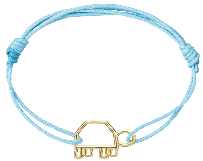 Sky blue cord bracelet with a gold turtle shaped pendant