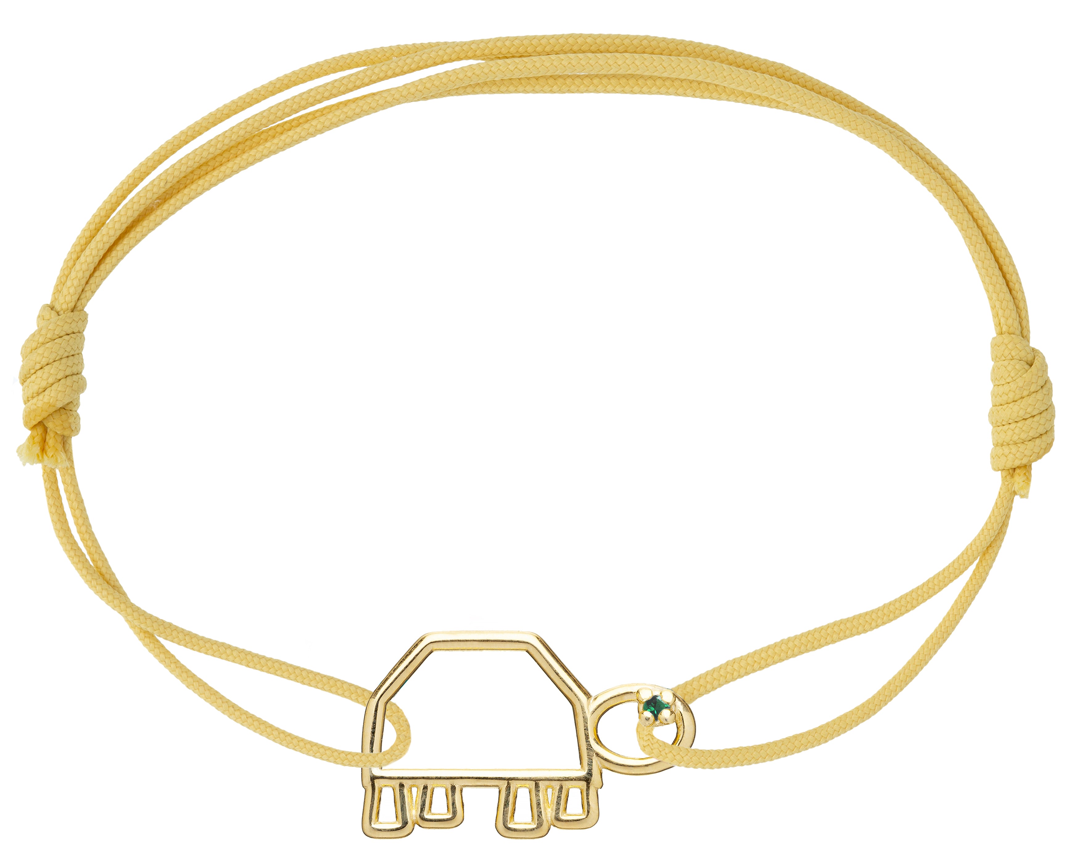 Yellow eco cord bracelet with a small turtle shaped gold pendant with an emerald eye