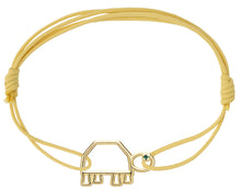 Load image into Gallery viewer, Yellow eco cord bracelet with a small turtle shaped gold pendant with an emerald eye
