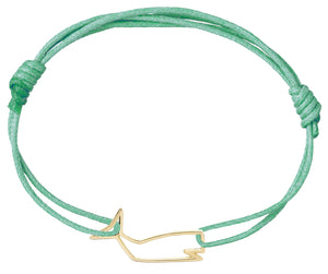 Mint green cord bracelet with a whale shaped gold pendant
