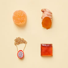 Carica l&#39;immagine nel visualizzatore di Gallery, Composition with dragon fruit coral necklace and orange food
