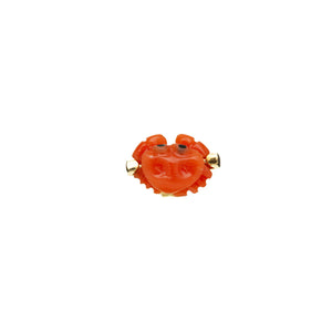 Gold earring with mini crab shaped coral