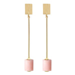 Gold long earrings with cylinder cut pink opal