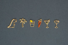 Load image into Gallery viewer, Jewelry gold pendants shaped like dinosaur. palm tree, carrot, tequila shot, martini drink
