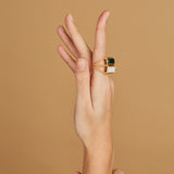 Gold square rings with jasper stone and white agate worn by model