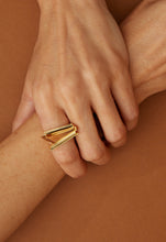 Load image into Gallery viewer, Gold ring with triangular cut citrine stone on woman&#39;s hand
