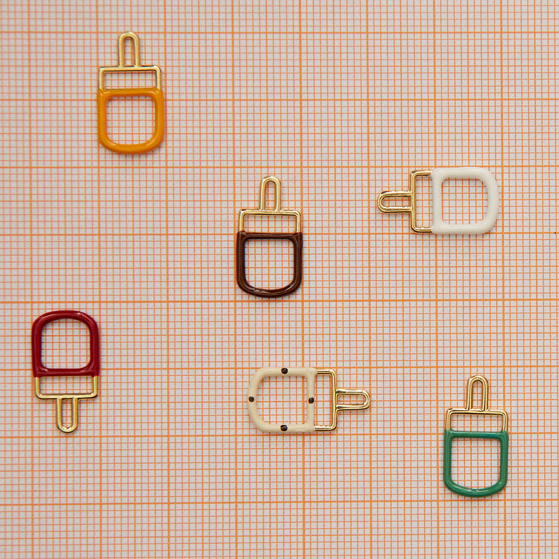 Ice pop shaped gold pendants with colored enamel