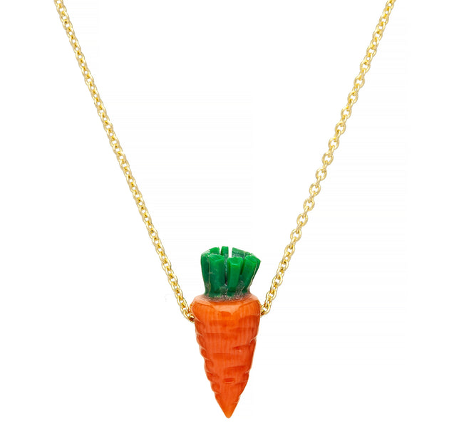 Gold chain necklace with small carrot shaped coral pendant with turquoise leaves