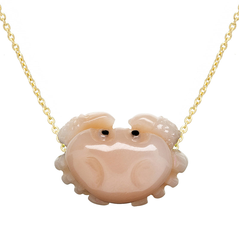Gold chain necklace with crab shaped pink coral pendant