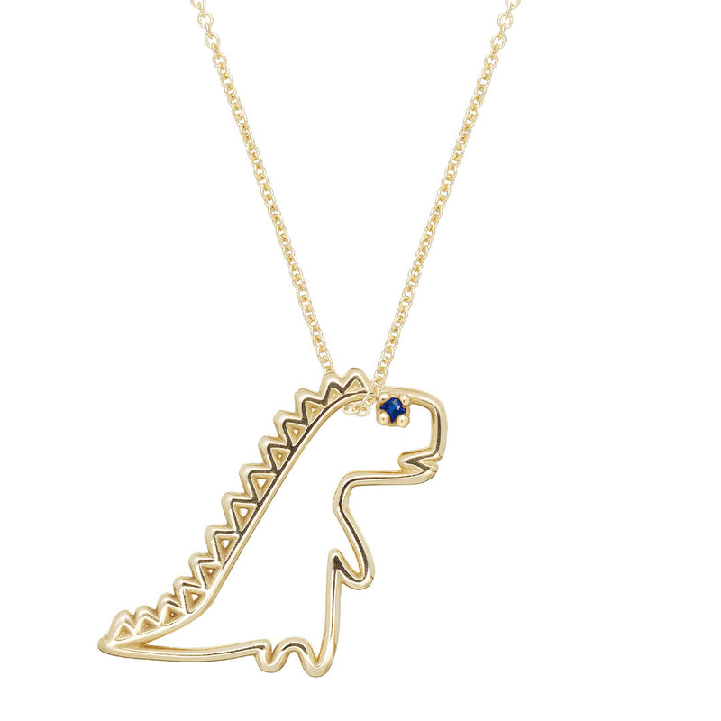 Gold chain necklace with dinosaur shaped pendant and small blue sapphire