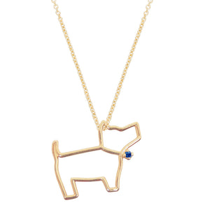 Gold chain necklace with a little dog shaped pendant with a blue sapphire
