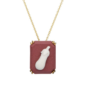 Gold chain necklace with an eggplant shaped cameo made in porcelain