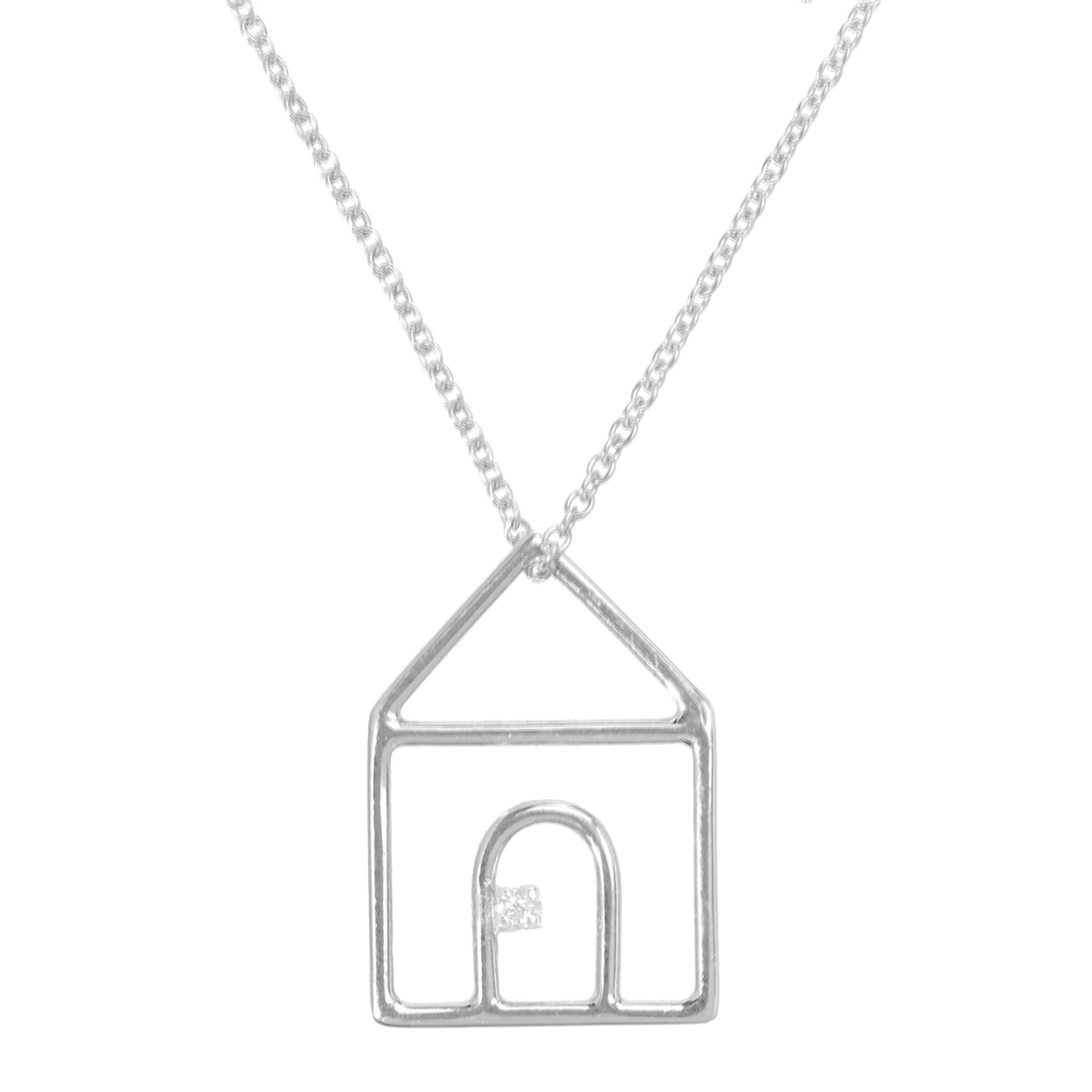 White gold chain necklace with house shaped pendant and small diamond