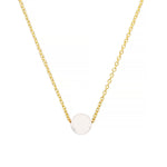 Gold chain necklace with a full moon shaped white coral