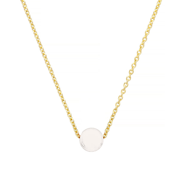 Gold chain necklace with a full moon shaped white coral