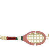 Gold chain necklace with gold tennis racquet and ball shaped pendants in pink and yellow enamel
